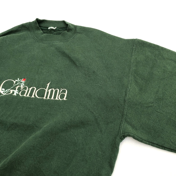 ノーブランド 古着 スウェット グリーン トレーナー 推定M