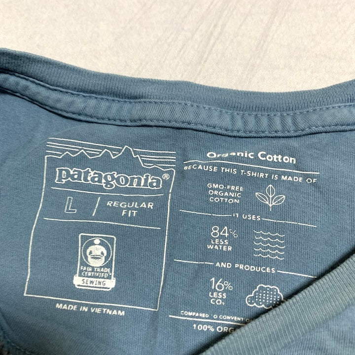 パタゴニア Patagonia Tシャツ ベトナム製 スカイブルー バックプリント メンズL