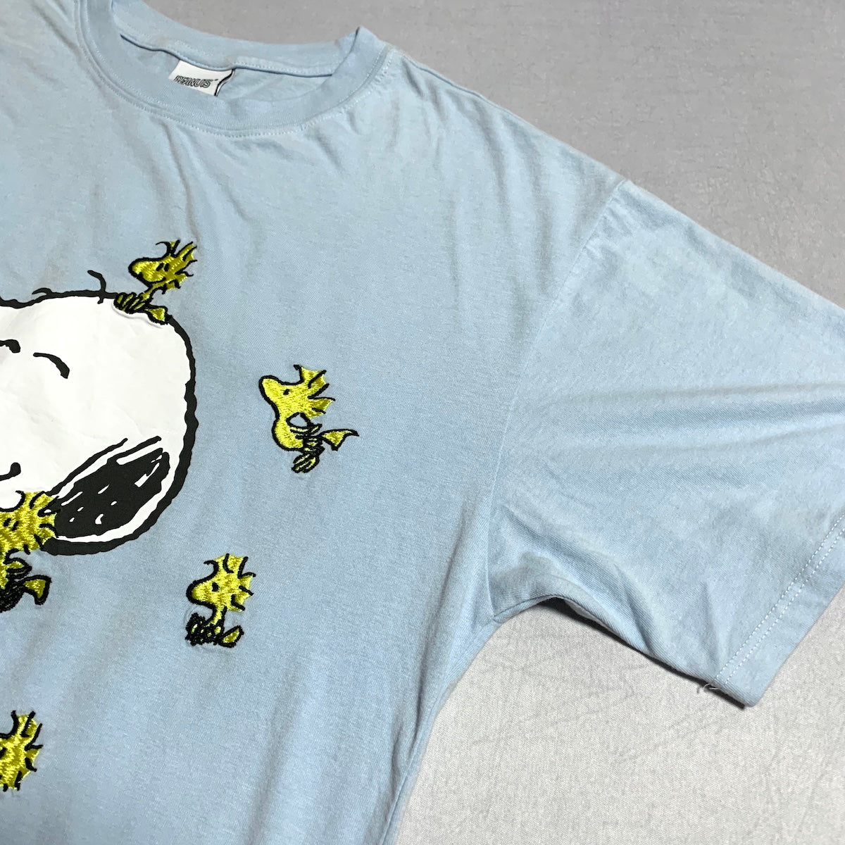 ピーナッツ PEANUTS Tシャツ スヌーピー 刺繍 ライトブルー メンズL
